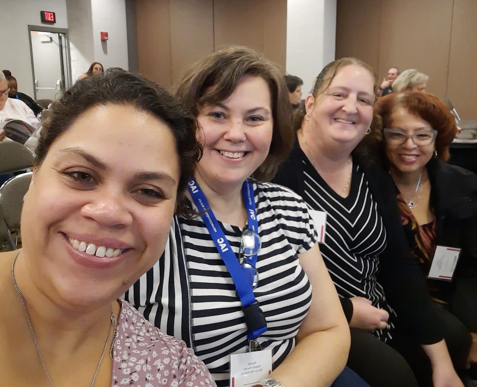 Group of employees smiling together